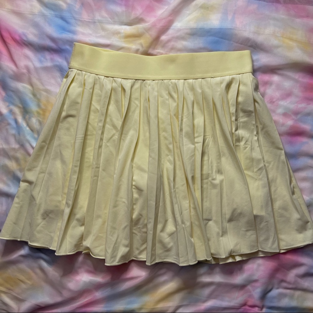 Aritzia tna pleated tennis skirt with shorts underneath 
-3 other colors in shop